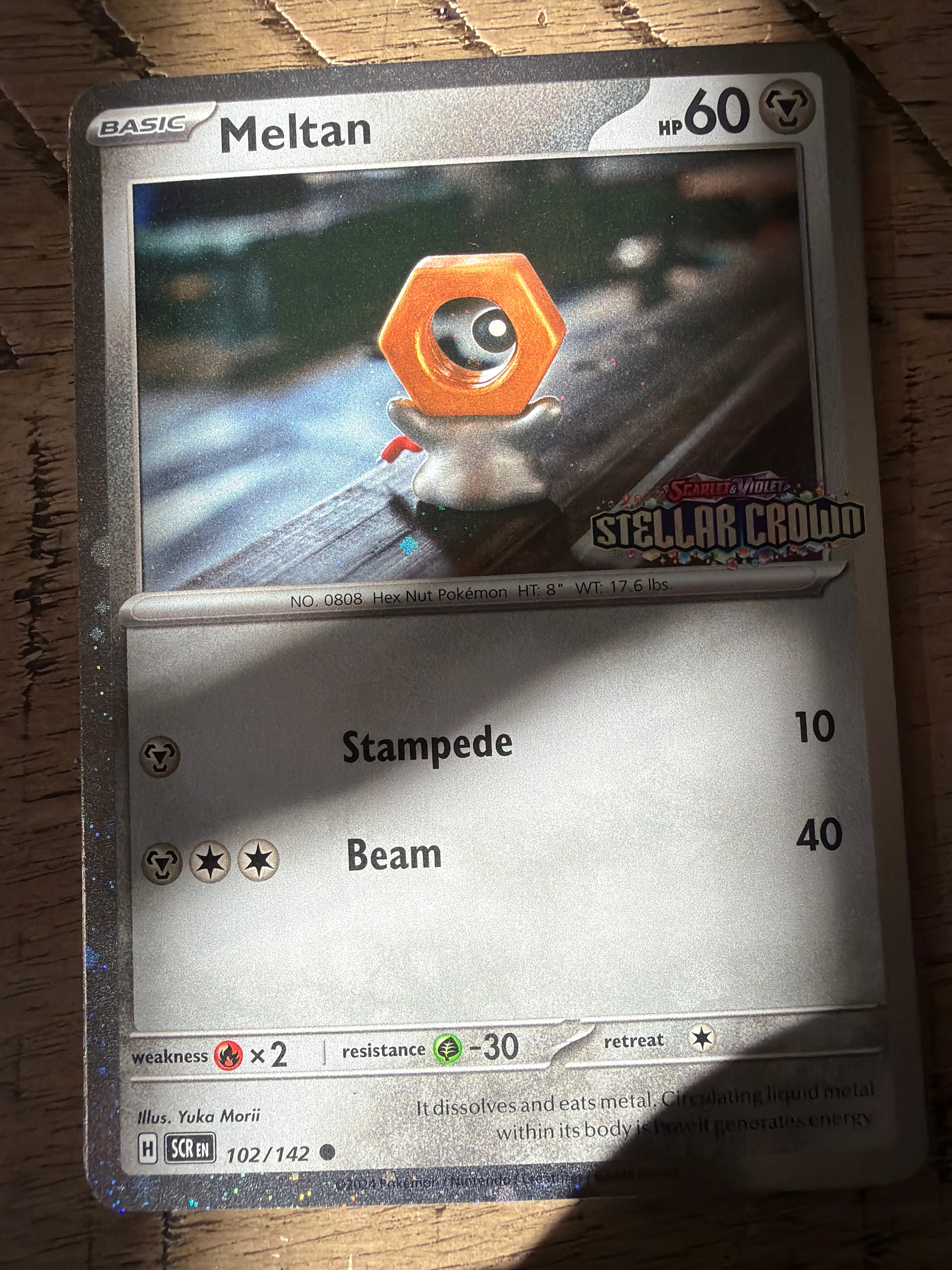 Meltan Cosmos Holo Promo #102 (stellar crown stamped)